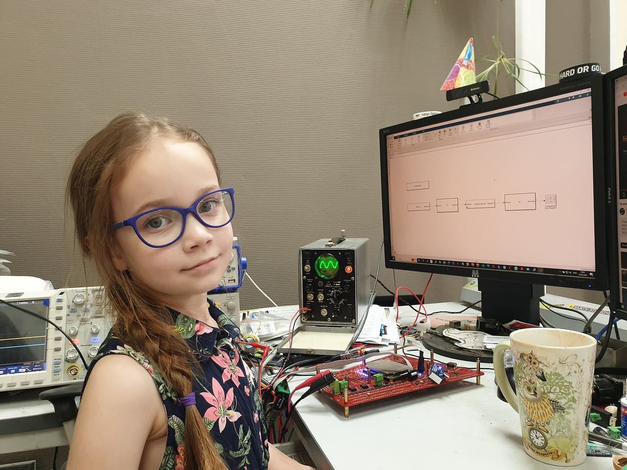 Engineer evaluating encoder documentation in the lab